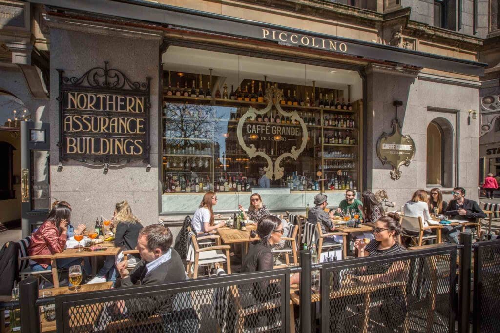 Dining terrace full of people at Piccolino Manchester.